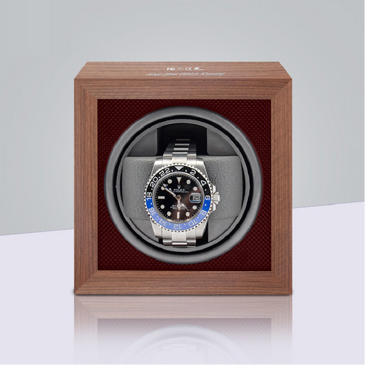 Black walnut single watch winder with red interior.